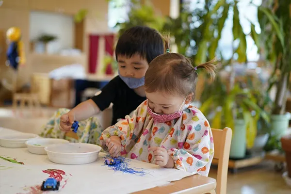 Students doing arts and crafts at Tokyo Children's Garden